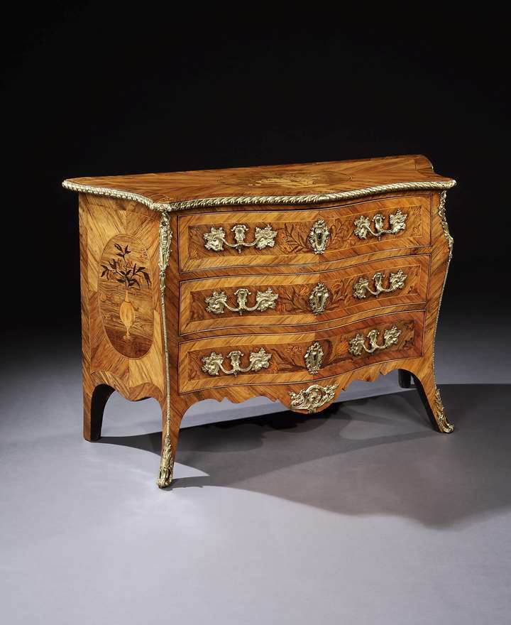 A GEORGE III ORMOLU MOUNTED KINGWOOD COMMODE